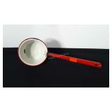 Enamel ladle. Some chips/rust. Handle is about
