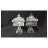 Two glass covered candy dishes, both are 9" h