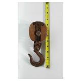 Wood and metal pulley.  Total length is 8 inches.