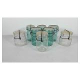Eight glass atlas Mason jars with glass lids