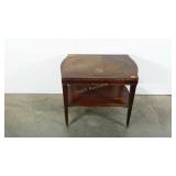 Accent table with leather look top, metal wheels,