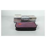 CDs, and CD organizer, includes Celine Dion,