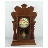 Gingerbread mantle clock with pendulum and keys,