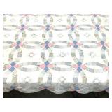 Machine made quilt, lightweight, ring and stars