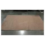 Lightweight area rug in tan. 5
