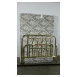 Full-size brass bed complete with mattress and