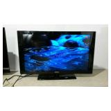 Samsung 46" flat screen TV on stand. No remote.