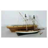 Two model boats, both could use some work, over