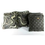 Seven accent pillows in two pattern.