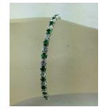 Simulated emerald and CZ huggie earrings and 7in