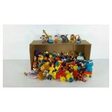 Box full of assorted small toys. Includes, Sesame
