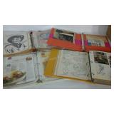 4 spiral bound notebooks filled with recipes and