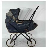Vintage doll stroller. Material shows age but