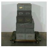Six metal card catalogues. Each with two drawers,