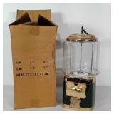 Candy dispenser with key in original box. Stands