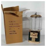 Candy dispenser with key in original box. Stands