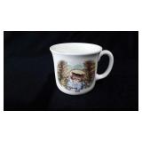 "Tom Kitten climbed up the rockery" cup by