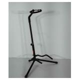 Guitar stand. Height is adjustable.