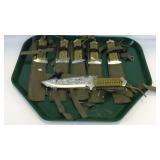 Six hunting knives with cases