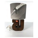 Arrow shaped table lamp with snowboarding themed