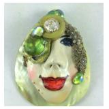 Brooch, face with stones handmade
