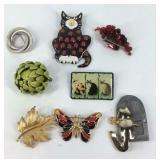 Eight brooches
