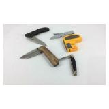 Pocket knifes two are Buck and a sharpener