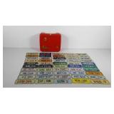 Lunch box full of souvenir license plates,