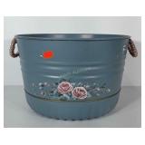 Metal painted tub with rope handles. Measures 12"