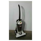 Hoover Wide path upright vacuum with attachments.