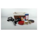 Basket of ping pong supplies, includes balls,