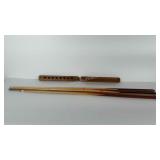 5 Pool sticks and wall mount rack. One stick