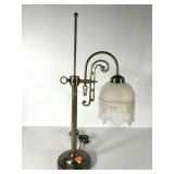 Lamp with glass shade and beaded fringe, stands