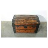 Wood wrapped camel top trunk. Carry handles and