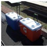 Two Rubbermaid Coolers, note the drain plugs on
