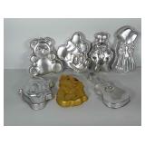 Metal cake pan molds including some from the