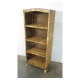 Woven shelving unit. Perhaps for a bathroom or