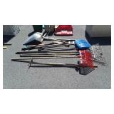Long handled tools lot. Rakes, pick, scoop,