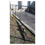 Two Sets of Snow Skies with poles. Poles appear