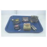 Partial containers of BBs, lead balls, CO2