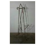 Iron display easel. 56" high.