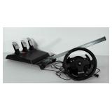 Thrustmaster feedback racing game controller.