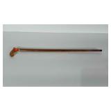 Walking cane. Wood base. Has wear as shown. Looks