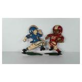Two Homco football player wall decor, 11"