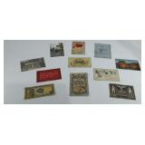 Group of postcards, foreign money, and German