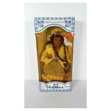Porcelain doll in original box.