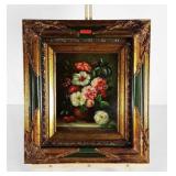 Small floral painting on board in ornate frame,