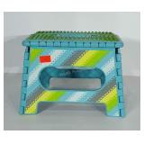 Folding step stool. 8 inches tall.