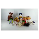 Group of plush cartoon characters, includes Olaf,