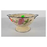 Enameled colander with flower motif